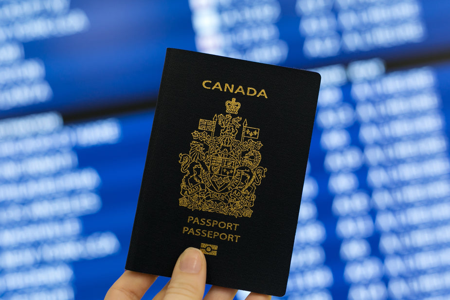 Person holding Canada passport