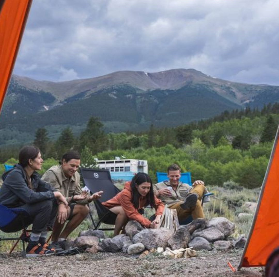 4 people camping in royal robbins clothing