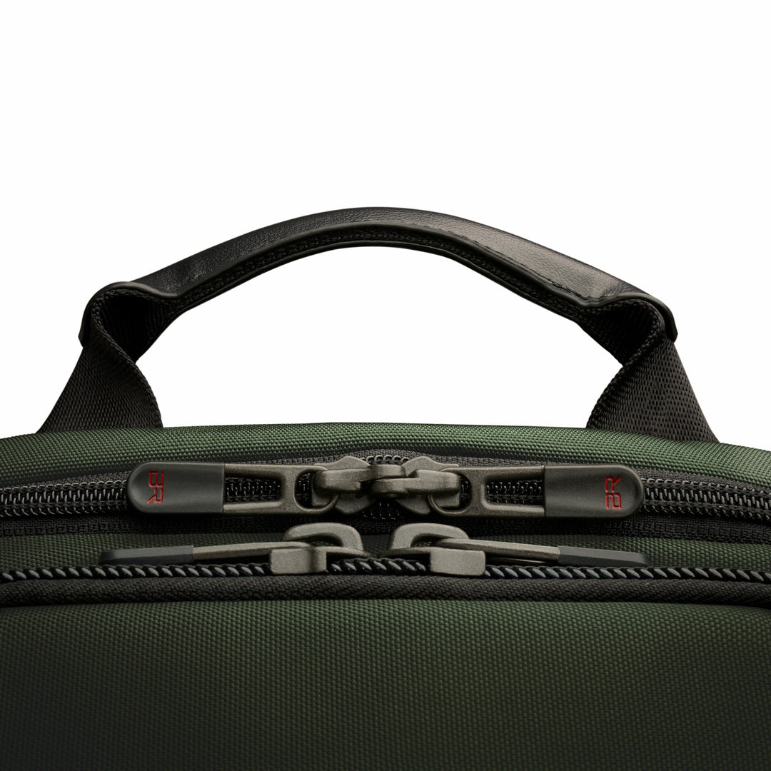 Briggs and Riley backpack has leather top handle touch point