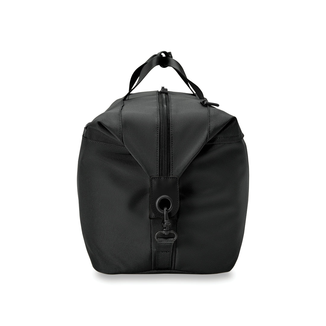 Side view of black briggs and riley weekender duffel bag