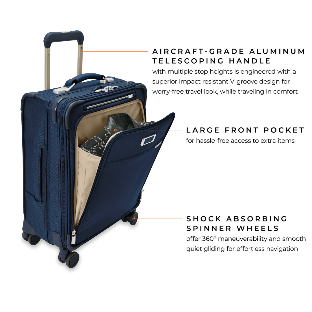 Baseline global carry on spinner in navy blue has large front pocket to access items hassle free