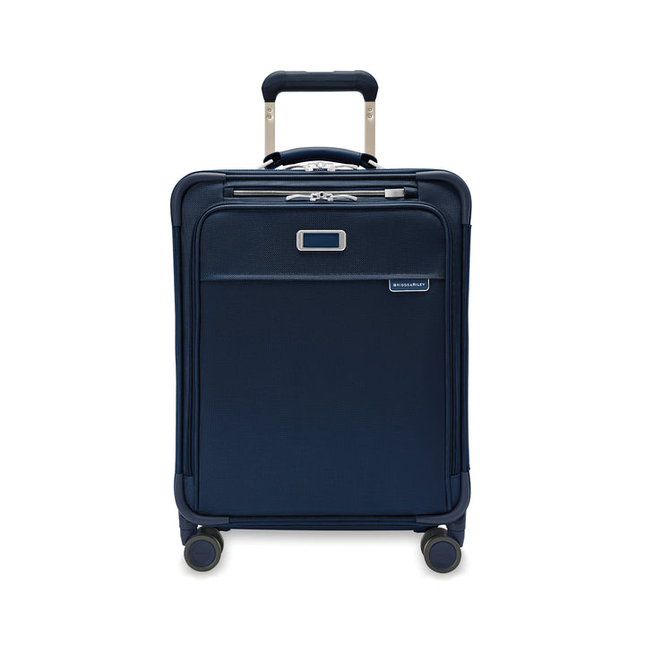 Briggs and riley baseline navy blue international 4 wheeled carryon suitcase