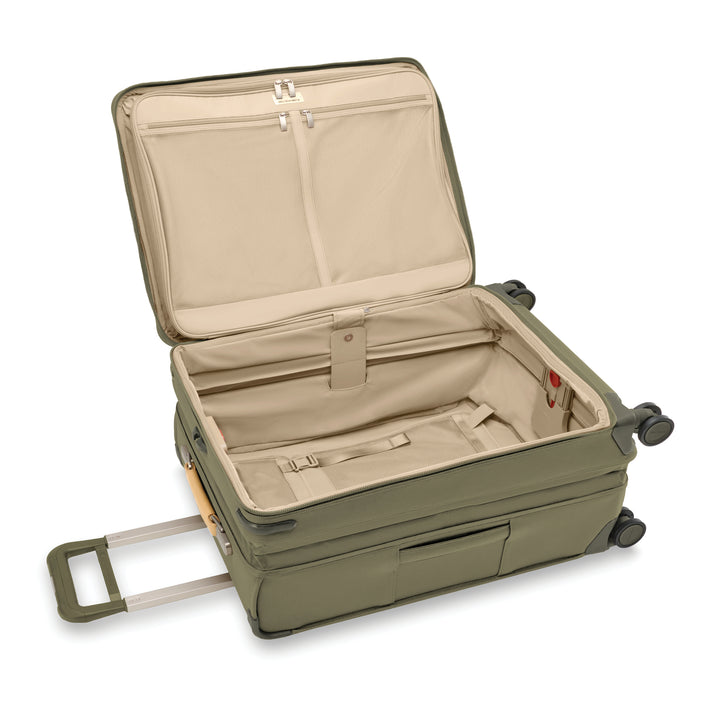 Interior of Medium Expandable Spinner features light tan lining to easily see belongings