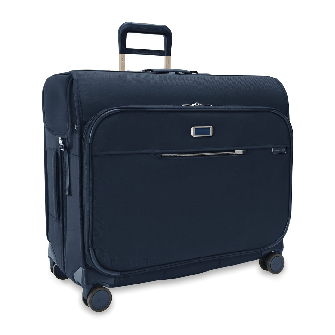 Briggs & Riley Baseline Deluxe Wardrobe Spinner in Navy Blue has four spinning wheels