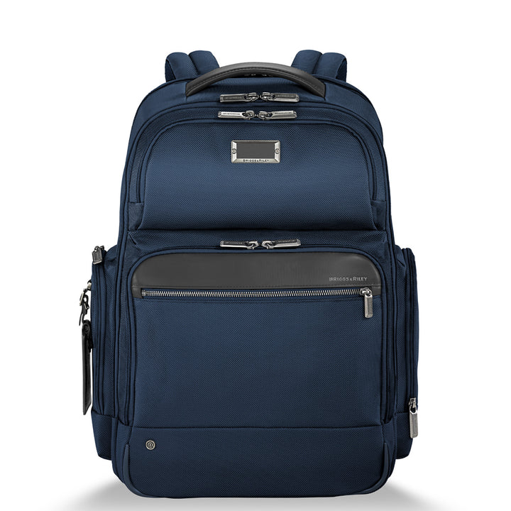 Navy blue large backpack front view with lots of pockets