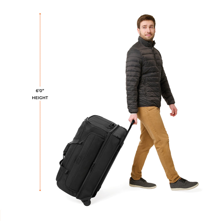 Male model is 6 foot tall and wheels Large duffel bag