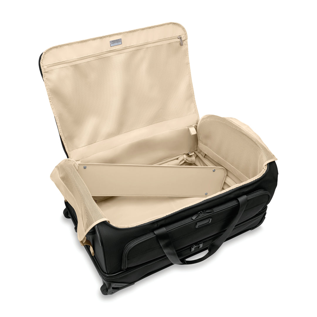 Interior of Baseline 2 wheel Large Duffle bag has organizational zippered pockets