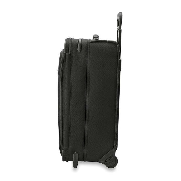 Side view of Black medium expandable upright luggage