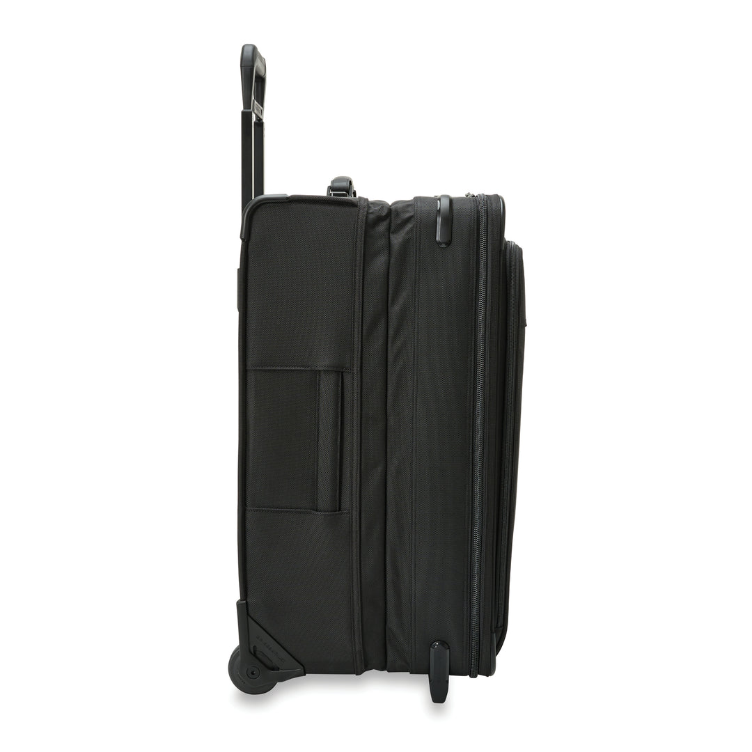 Side View of Medium expandable upright suitcase in color blakc