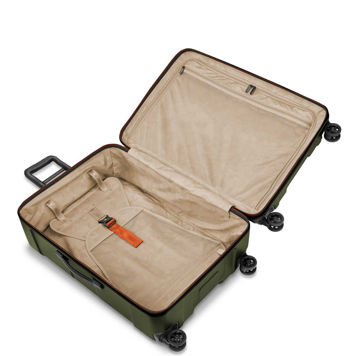 Green large hardside torq suitcase interior with beige lining for visibility