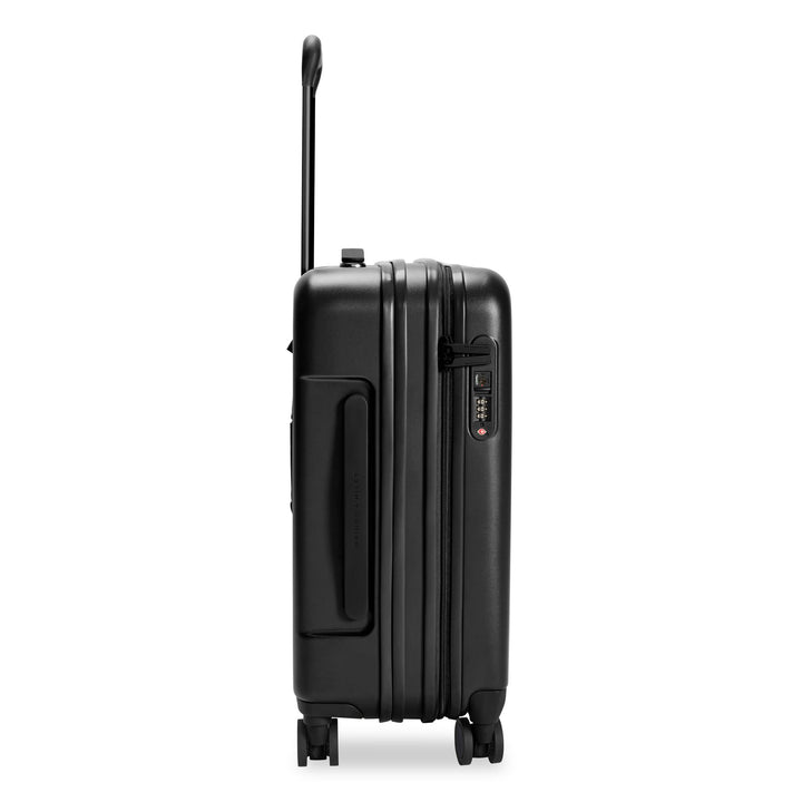 Side view of black Briggs & Riley Sympatico Global 21" Carry-On Expandable Spinner has TSA combo lock