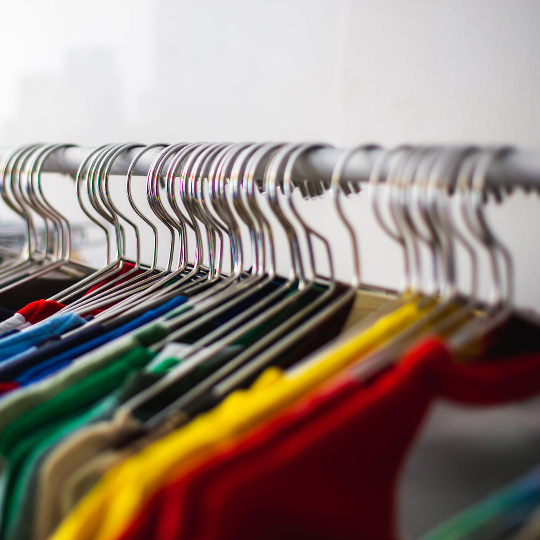 Wire hangers on clothing rack hanging t shirts