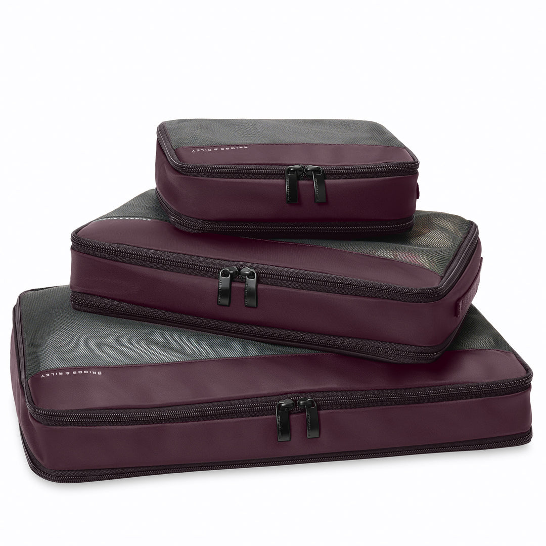 Briggs and Riley plum purple Check In packing cube set stacked