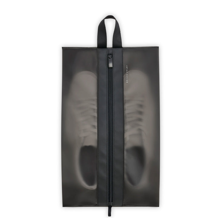 shoe pouch with white sneakers inside