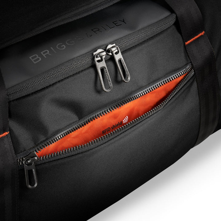 Closeup of SpeedThru pocket with RFID shield and bright orange lining