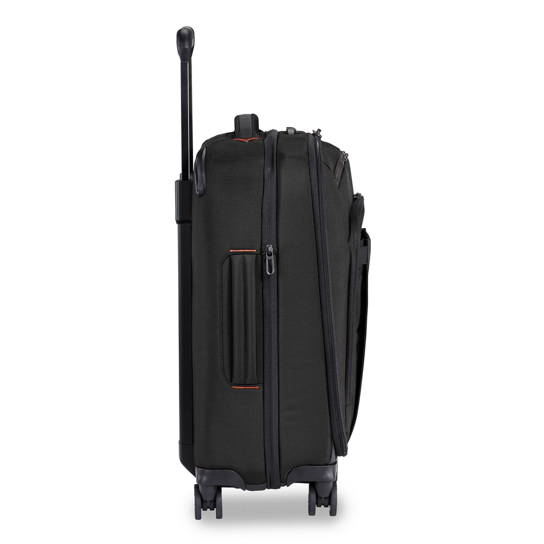 Briggs & Riley ZDX International 21" Carry-On Expandable Spinner Side profile with red stitch detail and telescoping handle