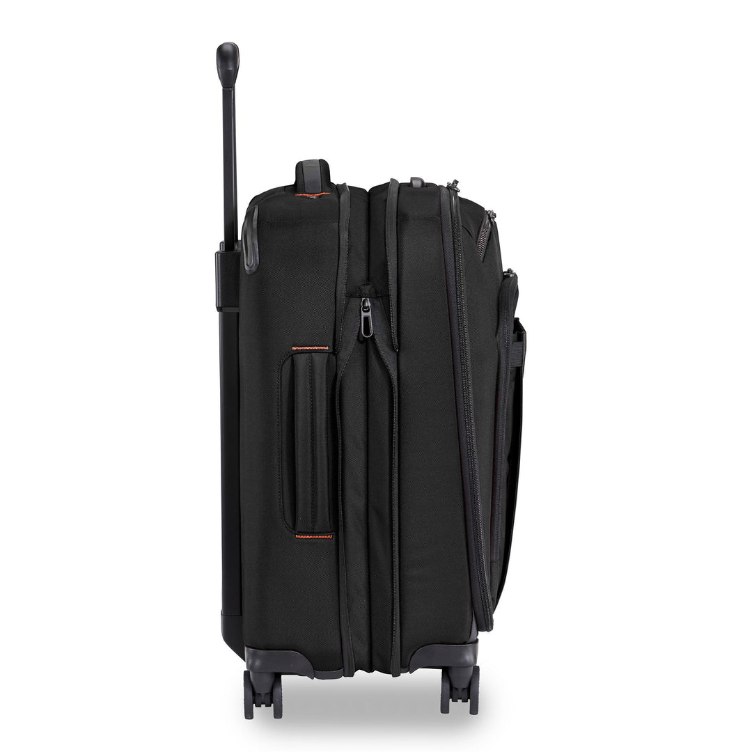 Side view shows Briggs & Riley ZDX International 21" Carry-On Expandable Spinner can expand for more packing space