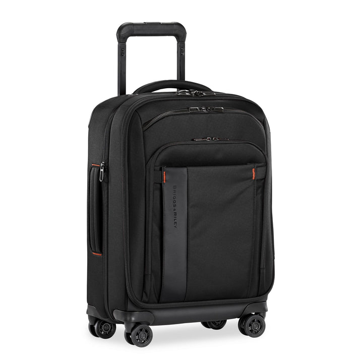 Briggs & Riley ZDX International 21" Carry-On Expandable Spinner in color black with red detail stitching and 4 spinning wheels