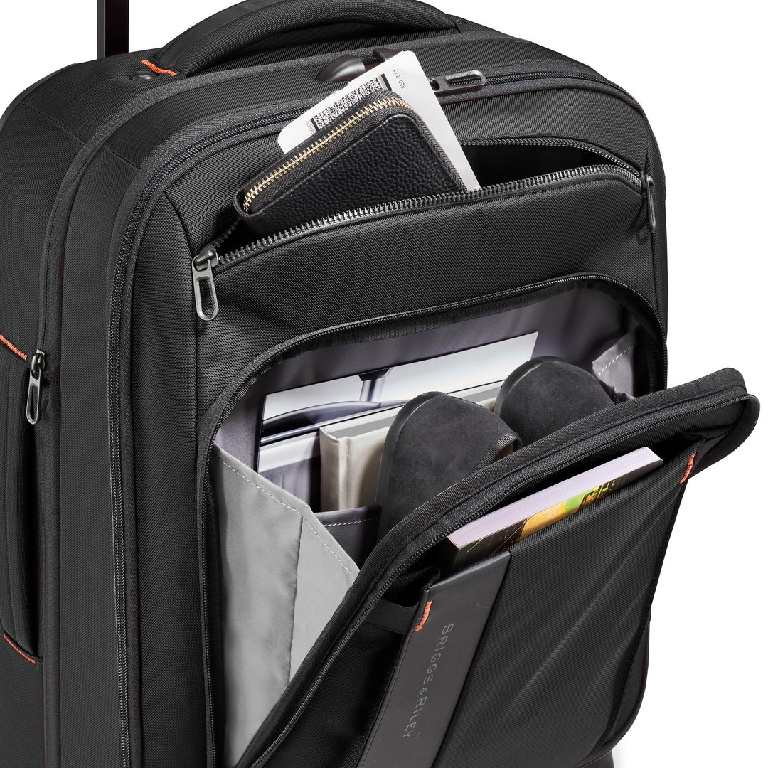 Briggs & Riley ZDX International 21" Carry-On Expandable Spinner has front pocket for easy access to books, sweater, journal, magazine and slippers