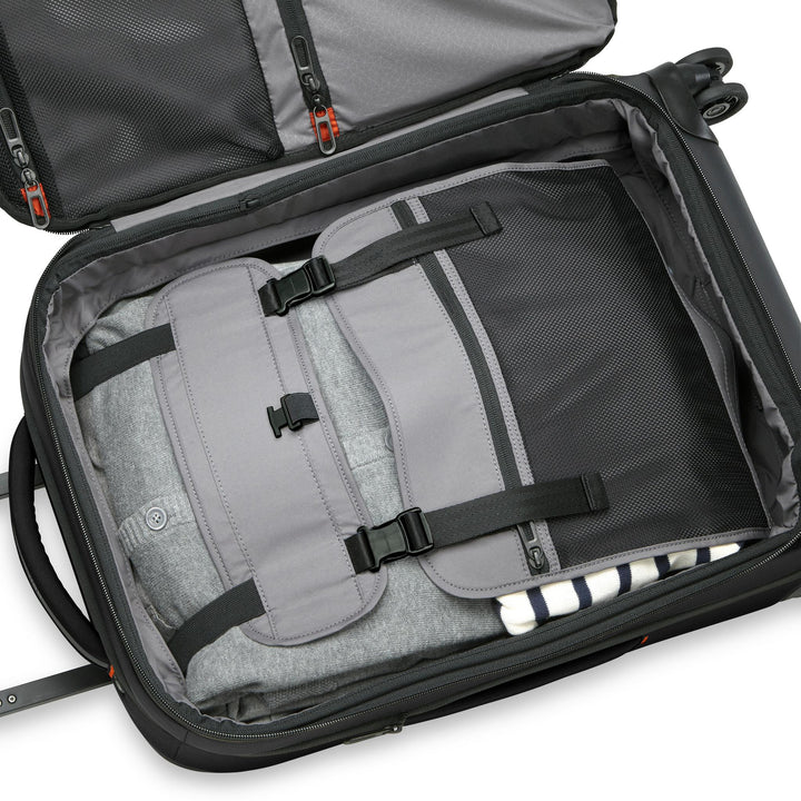 Interior Briggs & Riley ZDX Domestic 22" Carry-On Expandable Spinner has extra wide garment panels gently hold your clothes in place to minimize wrinkling