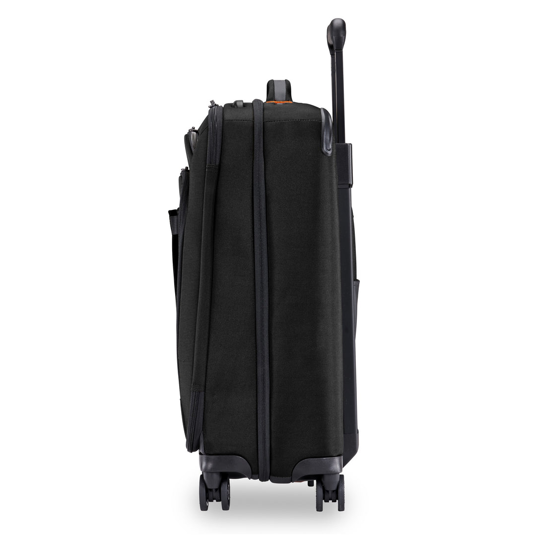 Side view of Briggs & Riley ZDX Domestic 22" Carry-On Expandable Spinner featuring cushioned top handle