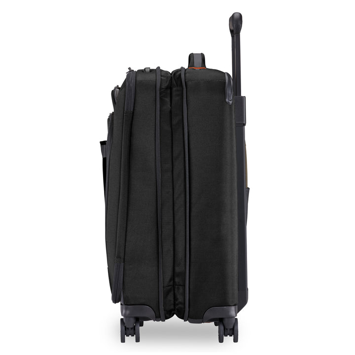 Side view of Briggs & Riley ZDX Domestic 22" Carry-On Expandable Spinner expanded to pack more