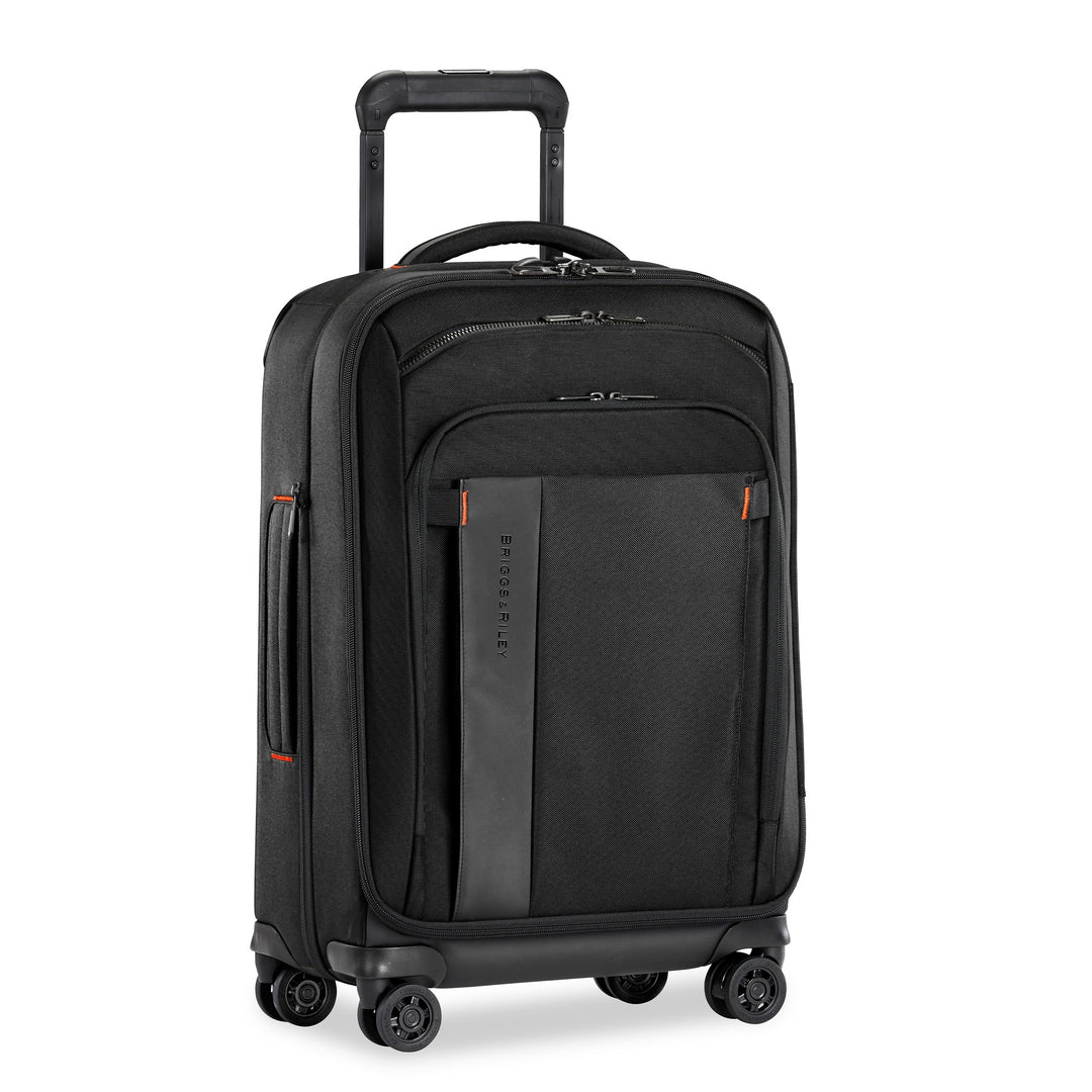 Black color with orange details Briggs & Riley ZDX Domestic 22" Carry-On Expandable Spinner has cushioned top and side handles 