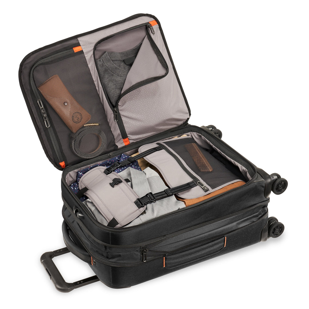 Briggs & Riley ZDX Domestic 22" Carry-On Expandable Spinner Inside is packed and strapped down for extra security