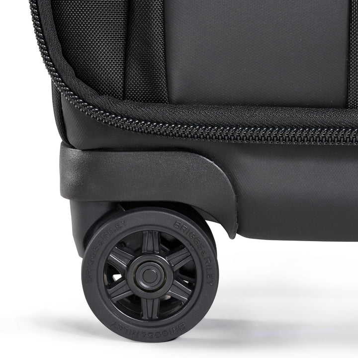 Close up of spinner wheels Back view of Briggs & Riley ZDX Large Expandable Suitcase