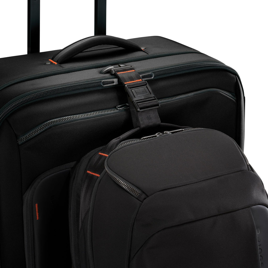 Smart link strap hooks backpack to luggage for easy carry through airport