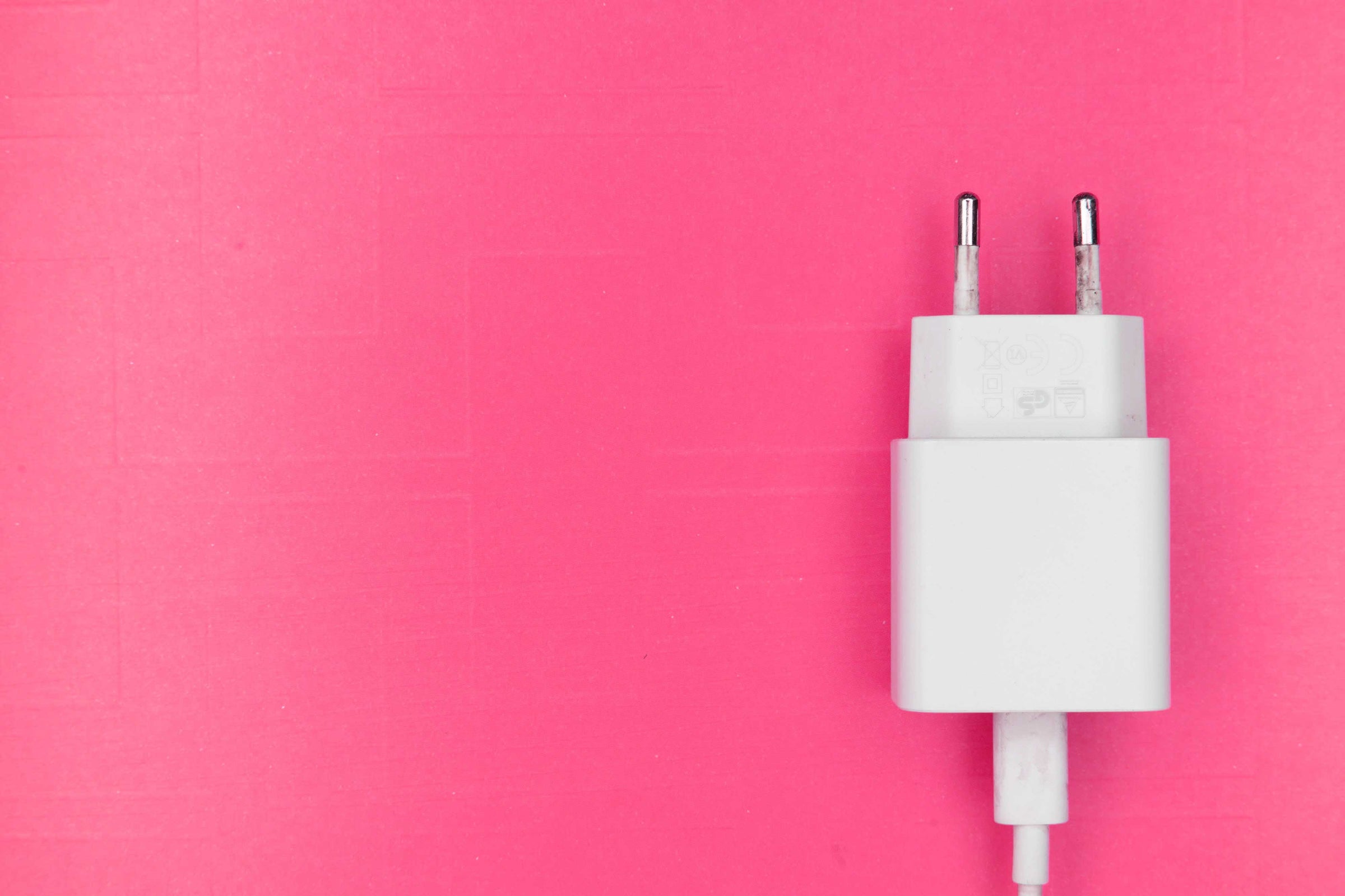 Europe power plug on pink background