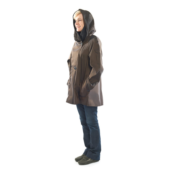 Side View of Woman Wearing Brown Rain Jacket Mini Size by Mycra Pac