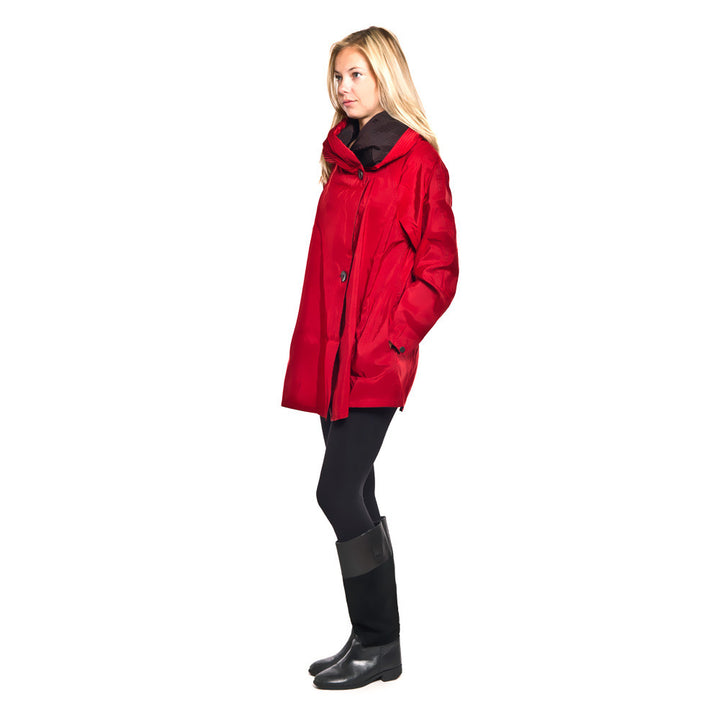 Mycra Pac Raincoat Red shown on lady