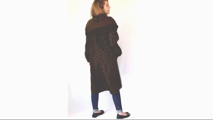 Video of Mycra Pac Tea Length Coat